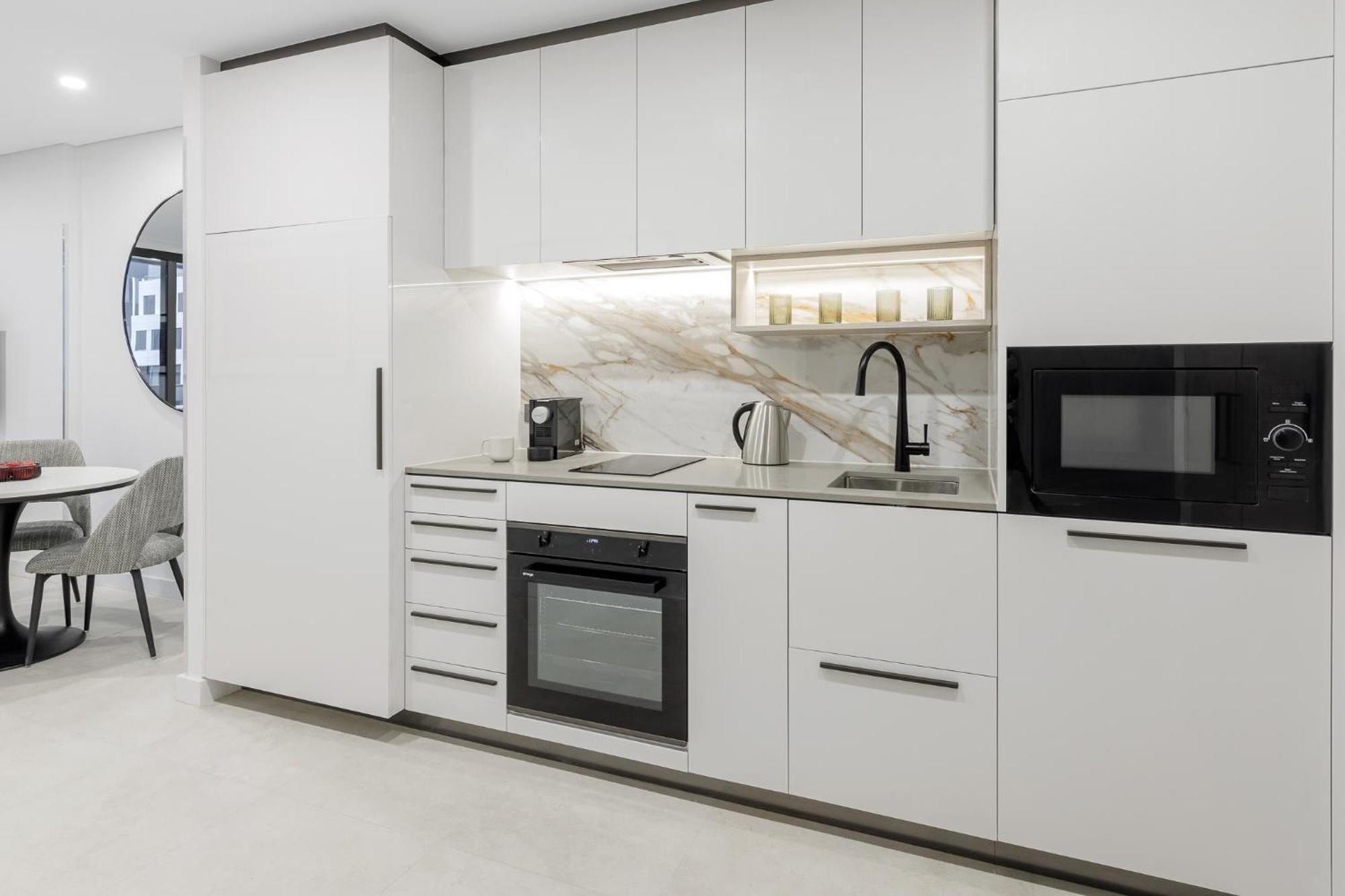 Meriton Suites キャンベラ エクステリア 写真 A modern kitchen